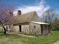 The smokehouse is the only other original building at Locust Grove