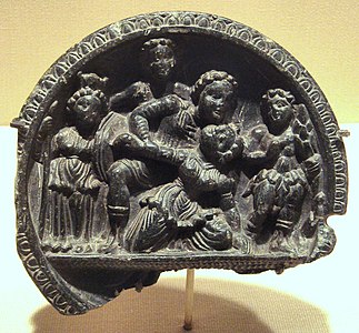 Mythological scene with Athena (left) and Herakles (right), on a stone palette of the Greco-Buddhist art of Gandhara, India