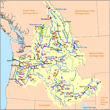A map shows the locations of many river dams on the Columbia River and its tributaries. They extend from near the river mouth in Oregon and Washington up these rivers into Nevada, Idaho, Wyoming, Montana, and British Columbia.