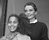 Hepburn with a child during a UNICEF mission.