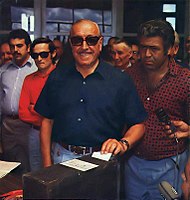 Perón's stand-in, Héctor Cámpora, votes in the 1973 elections. Perón nominated Cámpora to placate the Left, but their support for Perón waned after the leader made them guilty by association for the growing wave of violence.