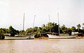Two working bedars (both about 45' LOD) waiting for the season to sail up to Thailand on a salt run, Terengganu, 1980