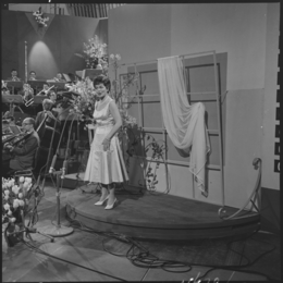 Photo of Lys Assia, the first winner of the Eurovision Song Contest, performing at the third contest in 1958.