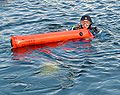 Delayed surface marker buoy with diver at the surface
