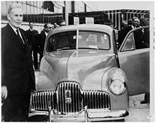 Then-Prime Minister of Australia Ben Chifley at the launching of the first mass-produced Australian car at the General Motors-Holden factory, Fisherman's Bend.