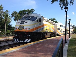 A southbound SunRail train leaving Winter Park station