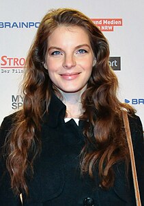 Chestnut color hair also has a reddish tint, but is less red and more brown than auburn hair. This is German singer Yvonne Catterfeld