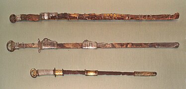 Two Chinese swords (top) of the Sui dynasty. Bottom: Japanese sword with scabbard, Kofun period, 6th century, Met Museum.