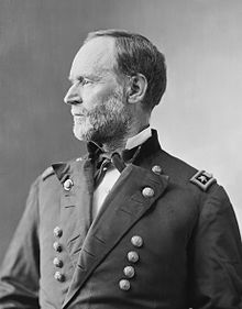 Black-and-white photograph of Sherman looking to the right