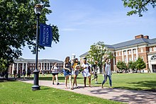 The Great Lawn of Christopher Newport University, featuring the McMurran and Forbes academic buildings.
