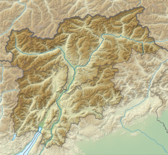 Mapa konturowa Trydentu-Górnej Adygi, u góry znajduje się punkt z opisem „źródło”, natomiast w centrum znajduje się punkt z opisem „ujście”