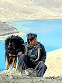Tibetan man with his Mastiff