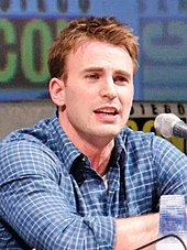 A photograph of actor Chris Evans attending a panel for "Captain America: The First Avenger" at San Diego Comic Con.