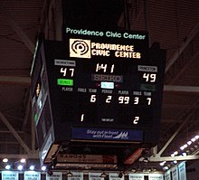 A cube scoreboard labeled "Providence Civic Center" showing the score Georgetown 47, Princeton 49 with 1:41 on the clock