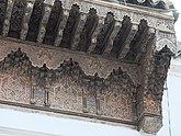 Detail of the wooden canopy above the entrance
