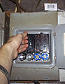 An older style fuse box of the variety used in the United States.