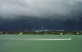 Summer afternoon showers from the Everglades traveling eastward over Downtown Miami