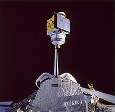 SATCOM KU-2 attached to a PAM-DII is being released from the cargo bay of the Space Shuttle Orbiter Atlantis during STS-61B