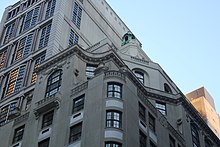 Detail of the top of the building's facade