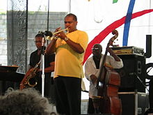 Ravi Coltrane (left), Terell Stafford, and Charnett Moffett (right) performing at the Newport Jazz Festival on August 13, 2005.