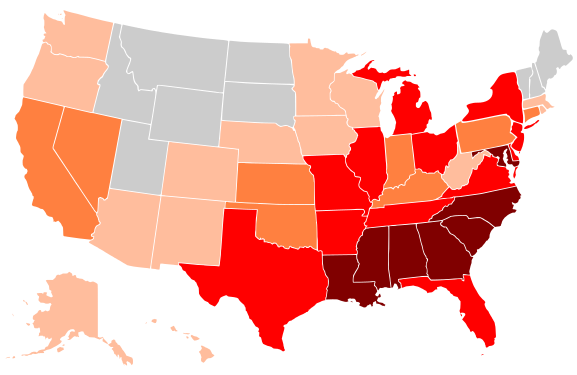 A map of the black percentage of the U.S. population by each state/territory in 1990. Black = 35.0+% Brown = 20.0–34.9% Red = 10.0–19.9% Orange = 5.0–9.9% Light orange = 1.0–4.9% Gray = 0.9% or less Pink = No data available