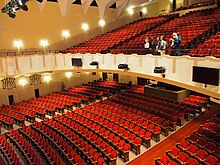 The interior of the Centennial Memorial Temple's auditorium, which consists of two levels of seating