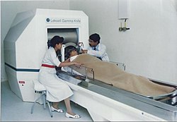 A doctor performing Stereotactic Gamma Knife Radiosurgery, a non-invasive procedure