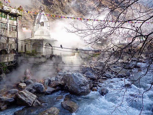 Outer view of the Manikaran temple and Manikaran Sahib gurudwara located at Manikaran featuring the hot water well and the Parvati river flowing past. This is the most famous place in the town.
