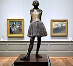 Little Dancer of Fourteen Years Cast posthumously in 1922 from a mixed-media sculpture modeled c. 1879–1880 Bronze Partly tinted, with cotton skirt and satin hair ribbon, on a wooden base Metropolitan Museum of Art New York City