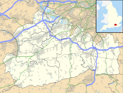 St Johns and Hook Heath occupies much of the mid-western suburban or urbanised three-quarters of the borough, north of the South West Main Line and between the A3 and M3 trunk road routes