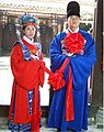Chinese couple wearing traditional wedding hanfu