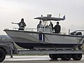 A boat of the Hellenic Coast Guard towed for a parade.