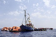Sea Watch 2, of Sea-Watch, picking up refugees adrift on liferafts