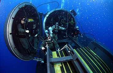 Navy divers and special operators attached to SEAL Delivery Team 2, perform SDV operations with USS Florida