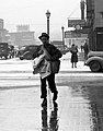 Newsboy, Iowa City, 1940, photographed by Rothstein while driving through town.