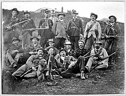 General Ben Viljoen and his Commando, Pelgrimsrus district (Pilgrim's Rest, South Africa). A baboon with a rifle, 1901.