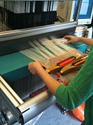 Weaving with three shuttles