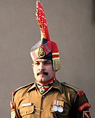 Sentry from the Indian Border Security Force, wearing a striped ascot