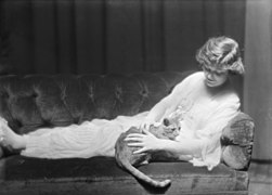 Ann Murdock with Buzzer the cat, monochrome