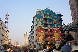The Graffiti Piece "Tante" (by Chen Dongfan) on the surface wall of an old residential building in Hangzhou, Zhejiang, China