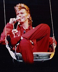 A man wearing a red outfit.