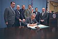 President Johnson signs a bill authorizing education programs for children with disabilities; from left to right: Hugh L. Carey, Dominick V. Daniels, Carl D. Perkins, Albert H. Quie, Winston L. Prouty, Cohen (1968)