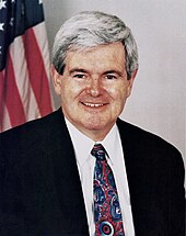 Official portrait of Newt Gingrich in front of an American flag
