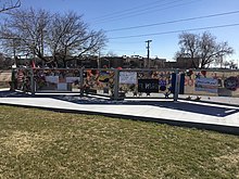 A memorial wall made to commence the victims of the Walmart shooting
