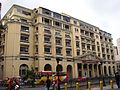 Bank of the Philippine Islands at Don Román Santos Building, a neo-classical, Graeco-Roman structure at Plaza Goiti (now Plaza Lacson)