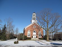 brick Congregational church in Williston, Vermont in winter