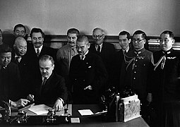Molotov signs the Soviet–Japanese Neutrality Pact.jpg