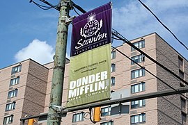 Dunder Mifflin banner in front of Scranton City Hall