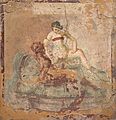 Sex between a female and a male.The figure on the left has a garland of rose petals around their head. The figure to the right is wearing a strophium which is a kind of bra or bikini top.[80] Pompeii. Around 70CE