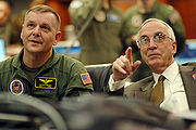 Vice Chairman of the Joint Chiefs of Staff U.S. Marine Gen. James E. Cartwright (left), and Deputy Defense Secretary Gordon R. England follow the progress of the Standard Missile-3.